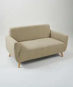 Housse de fauteuil ou de canapé bi-extensible.