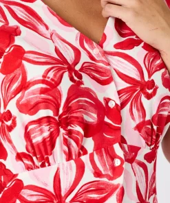 Robe tissu crêpe manches papillon