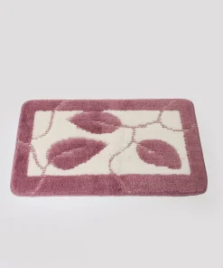 Tapis de bain motif feuilles.