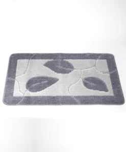 Tapis de bain motif feuilles.